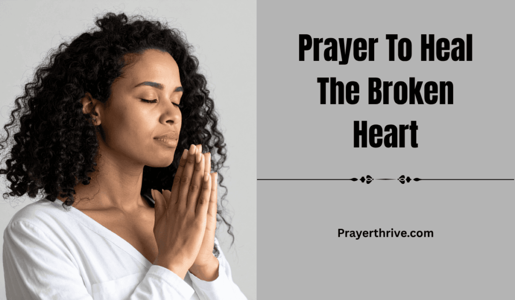 A woman sitting quietly by a window, hands clasped in prayer, finding comfort through heartfelt prayer to heal the broken heart.